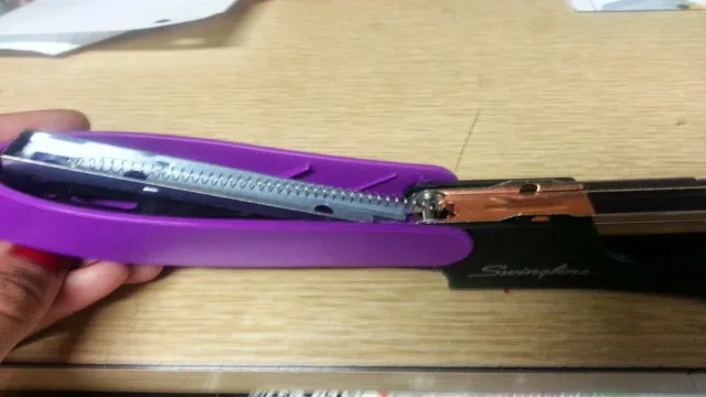 how to fix a staple gun spring