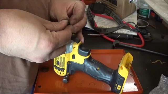 how to remove a bit from a dewalt impact driver