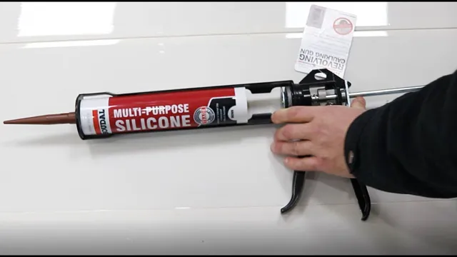 how to remove a tube from a caulking gun