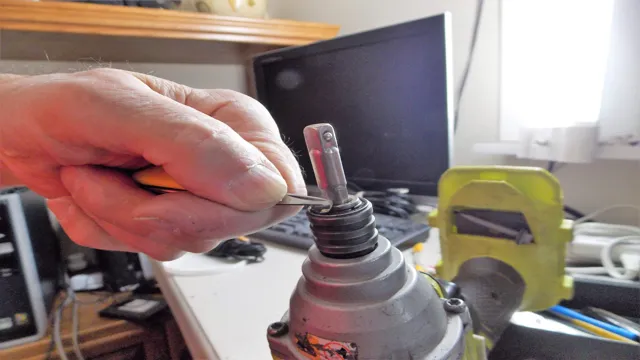 how to remove bit from ryobi impact driver