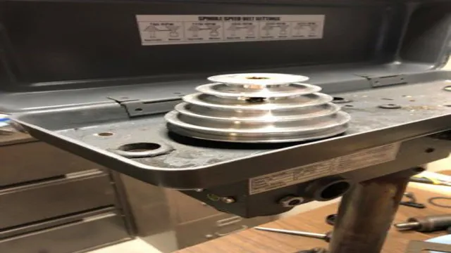 how to remove the pulley from a drill press spindle
